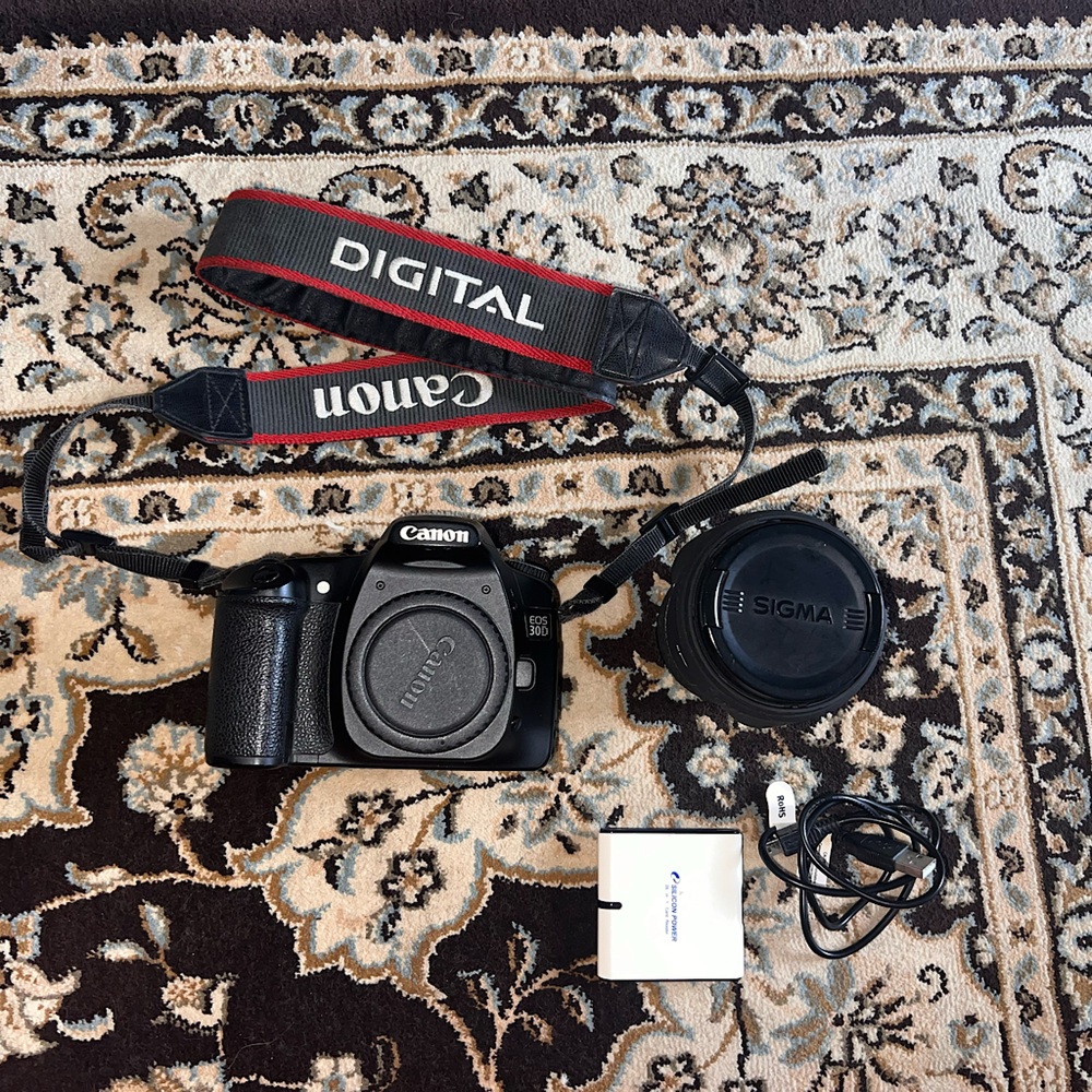 Canon EOS 30D Digital SLR Camera 
Sigma 18-50mm F/2.8 EX DC Lens